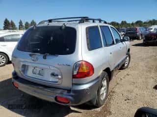 2003 Hyundai Santa Fe с VIN KM8SB12B13U405056, выставлен на аукционе Copart как лот 73671484 с пробегом Не указан миль и Списание • Salvage title. История ставок и продаж доступна на DreamBid. Изображение 3.