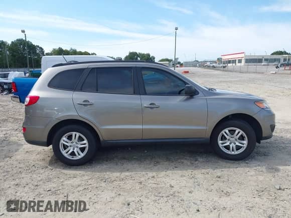 2012 Hyundai Santa Fe GLS с VIN 5XYZG3AB6CG112790, выставлен на аукционе IAAI как лот 43071542 с пробегом 260 083 миль миль и . История ставок и продаж доступна на DreamBid. Изображение 13.