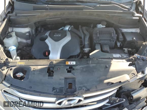 2015 Hyundai Santa Fe с VIN 5XYZWDLA7FG239808, выставлен на аукционе Copart как лот 80452375 с пробегом 128 952 миль миль и Списание • Salvage title. История ставок и продаж доступна на DreamBid. Изображение 12.