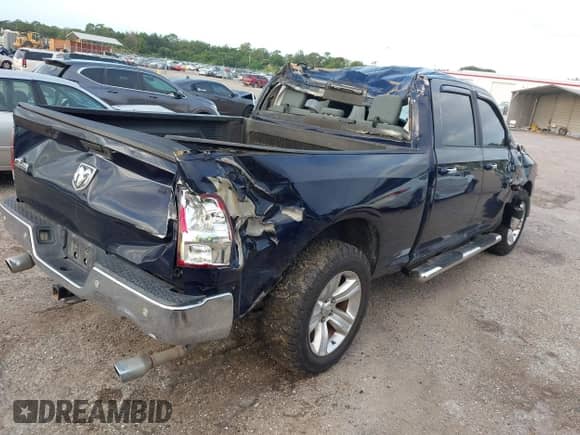 2016 Ram 1500 Big Horn with VIN 1C6RR6TT7GS165099, listed as a IAAI auction lot 43350834 with 200,258 mi miles and . Bid and sale history available at DreamBid. Image 4.