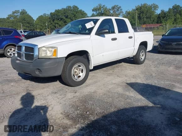 2006 Dodge Dakota ST with VIN 1D7HE28KX6S664685, listed as a IAAI auction lot 43125659 with 191,561 mi miles and . Bid and sale history available at DreamBid. Image 2.