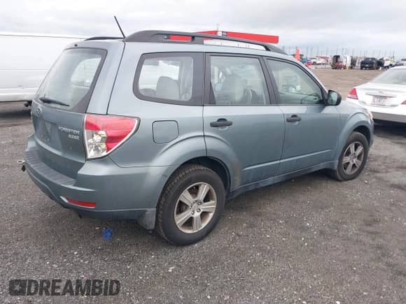 2011 Subaru Forester X with VIN JF2SHABC8BH738438, listed as a IAAI auction lot 43283096 with 166,632 mi miles and . Bid and sale history available at DreamBid. Image 4.