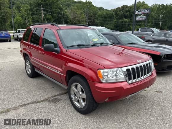 2004 Jeep Grand Cherokee Overland с VIN 1J8GW68J24C369856, выставлен на аукционе Copart как лот 65741725 с пробегом 199 771 миль миль и Чистый • Clean title. История ставок и продаж доступна на DreamBid. Изображение 1.