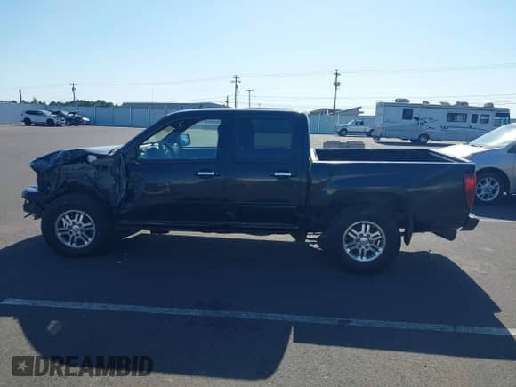 2011 Chevrolet Colorado 1LT z VIN 1GCHTCFE2B8115945, wystawiony jako IAAI lot #42314389 z przebiegiem 250 571 mil mil oraz . Historia ofert i sprzedaży dostępna na DreamBid. Obrazek 15.