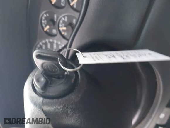 2002 Chevrolet Silverado 2500HD LS with VIN 1GCHK24UX2E117905, listed as a IAAI auction lot 41976869 with Not provided miles and . Bid and sale history available at DreamBid. Image 11.