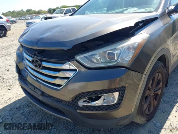 2014 Hyundai Santa Fe с VIN 5XYZU3LB8EG211894, выставлен на аукционе IAAI как лот 43115031 с пробегом 170 240 миль миль и . История ставок и продаж доступна на DreamBid. Изображение 6.