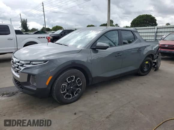 2024 Hyundai Santa Cruz SE с VIN 5NTJADAE2RH080860, выставлен на аукционе Copart как лот 86791885 с пробегом 12 505 миль миль и Списание • Salvage title. История ставок и продаж доступна на DreamBid. Изображение 1.