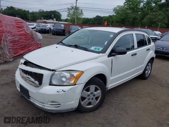 2008 Dodge Caliber SE with VIN 1B3HB28B28D625598, listed as a IAAI auction lot 42449035 with 125,987 mi miles and . Bid and sale history available at DreamBid. Image 6.