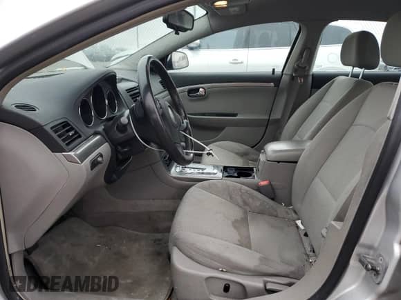 2009 Saturn Aura XE with VIN 1G8ZS57B09F158011, listed as a Copart auction lot 69934905 with 203,855 mi miles and Salvage title. Bid and sale history available at DreamBid. Image 7.