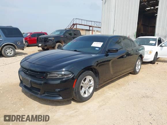 2021 Dodge Charger SXT with VIN 2C3CDXBG2MH628118, listed as a IAAI auction lot 42703180 with 86,141 mi miles and . Bid and sale history available at DreamBid. Image 2.