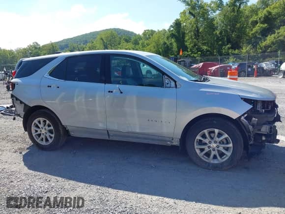 2018 Chevrolet Equinox LT z VIN 2GNAXJEV6J6202643, wystawiony jako IAAI lot #43005625 z przebiegiem 52 382 mil mil oraz . Historia ofert i sprzedaży dostępna na DreamBid. Obrazek 14.