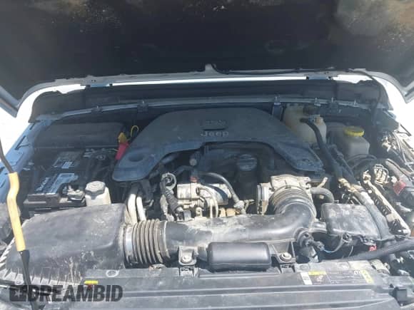 2021 Jeep Wrangler Unlimited Rubicon with VIN 1C4HJXFG5MW586842, listed as a IAAI auction lot 42186683 with 76,450 mi miles and . Bid and sale history available at DreamBid. Image 10.