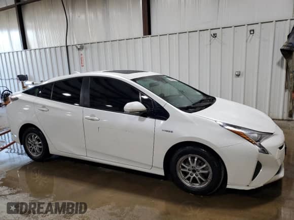2016 Toyota Prius Three z VIN JTDKARFU2G3011434, wystawiony jako Copart lot #84400565 z przebiegiem 228 758 mil mil oraz Szkoda całkowita • Salvage title. Historia ofert i sprzedaży dostępna na DreamBid. Obrazek 4.