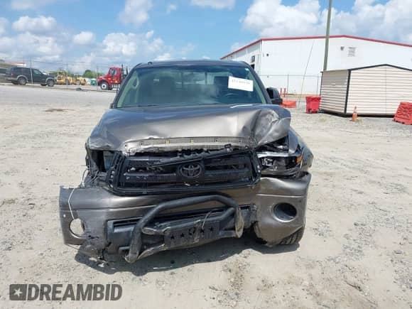 2013 Toyota Tundra Limited z VIN 5TFBY5F1XDX282367, wystawiony jako IAAI lot #42148030 z przebiegiem 124 357 mil mil oraz . Historia ofert i sprzedaży dostępna na DreamBid. Obrazek 12.