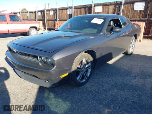 2013 Dodge Challenger SXT z VIN 2C3CDYAG0DH651095, wystawiony jako IAAI lot #43558284 z przebiegiem Nie podano mil oraz . Historia ofert i sprzedaży dostępna na DreamBid. Obrazek 2.