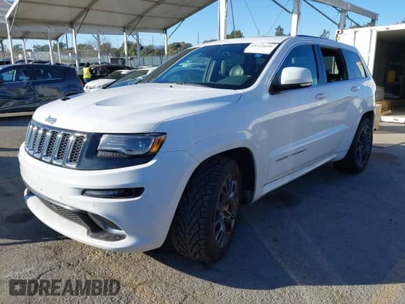 2015 Jeep Grand Cherokee SRT с VIN 1C4RJFDJ2FC115748, выставлен на аукционе IAAI как лот 41323699 с пробегом 64 628 миль миль и . История ставок и продаж доступна на DreamBid. Изображение 2.