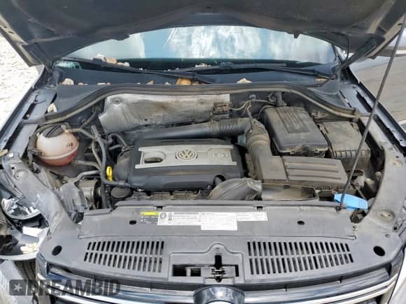 2014 Volkswagen Tiguan SEL z VIN WVGAV3AX7EW506170, wystawiony jako Copart lot #58852355 z przebiegiem 55 961 mil mil oraz Szkoda całkowita • Salvage title. Historia ofert i sprzedaży dostępna na DreamBid. Obrazek 12.