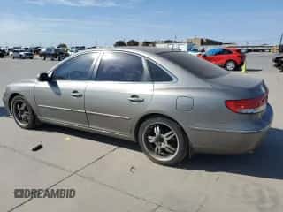 2009 Hyundai Azera GLS с VIN KMHFC46D89A358792, выставлен на аукционе Copart как лот 76666414 с пробегом 260 567 миль миль и Чистый • Clean title. История ставок и продаж доступна на DreamBid. Изображение 2.