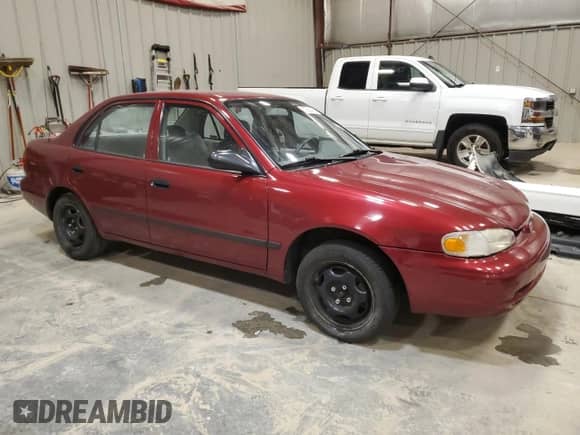 2000 Chevrolet Prizm LSi с VIN 1Y1SK5289YZ401410, выставлен на аукционе Copart как лот 57581435 с пробегом Не указан миль и На запчасти • Non repairable. История ставок и продаж доступна на DreamBid. Изображение 4.