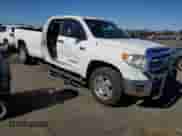 2016 Toyota Tundra SR with VIN 5TFCY5F1XGX020292, listed as a Copart auction lot 87105715 with 121,822 mi miles and Salvage title. Bid and sale history available at DreamBid. Image 4.