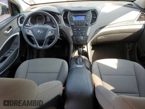 2016 Hyundai Santa Fe with VIN 5XYZTDLB9GG374517, listed as a Copart auction lot 70869645 with 63,795 mi miles and Salvage title. Bid and sale history available at DreamBid. Image 8.
