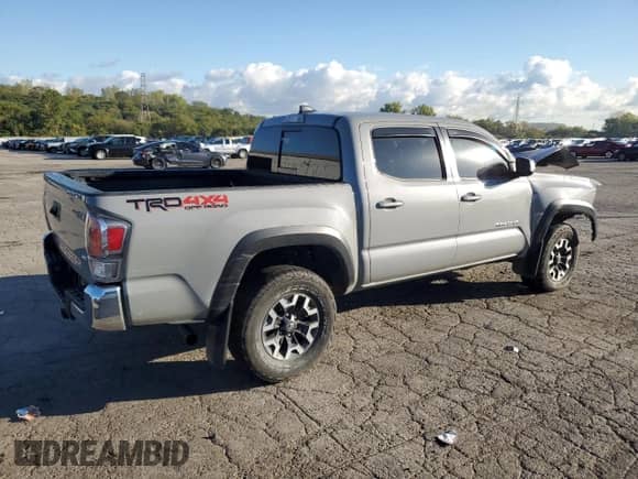 2021 Toyota Tacoma SR with VIN 3TMCZ5AN1MM425739, listed as a Copart auction lot 84917565 with 77,559 mi miles and Clean title. Bid and sale history available at DreamBid. Image 3.