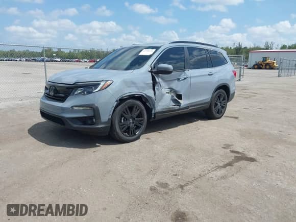 2022 Honda Pilot Special Edition with VIN 5FNYF5H29NB034421, listed as a IAAI auction lot 42108234 with 56,602 mi miles and . Bid and sale history available at DreamBid. Image 17.