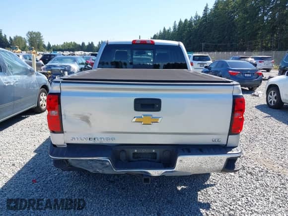 2014 Chevrolet Silverado 1500 LTZ with VIN 1GCUKSEC4EF197043, listed as a IAAI auction lot 42673341 with 131,445 mi miles and . Bid and sale history available at DreamBid. Image 16.