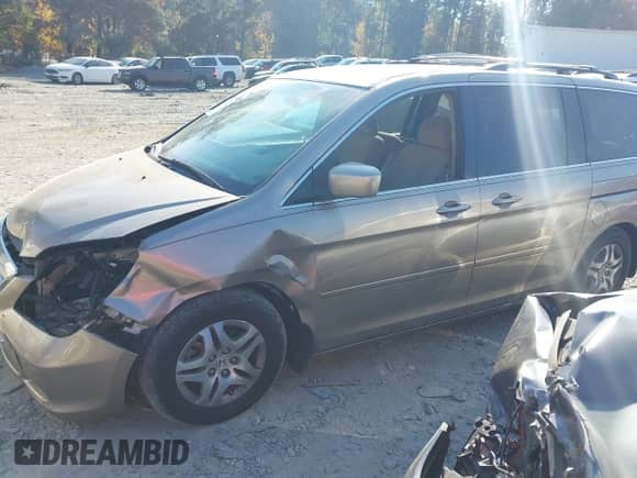 2007 Honda Odyssey EX z VIN 5FNRL38437B074662, wystawiony jako IAAI lot #40716076 z przebiegiem 228 344 mil mil oraz . Historia ofert i sprzedaży dostępna na DreamBid. Obrazek 2.