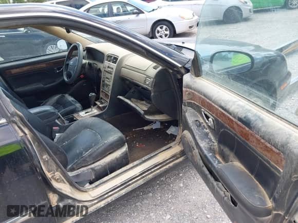 2005 Hyundai XG z VIN KMHFU45E25A390199, wystawiony jako IAAI lot #42910999 z przebiegiem 244 898 mil mil oraz . Historia ofert i sprzedaży dostępna na DreamBid. Obrazek 5.