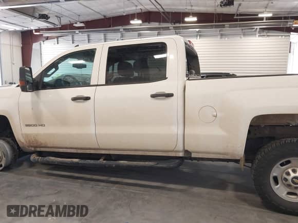2016 Chevrolet Silverado 2500HD Work Truck with VIN 1GC1KUE80GF124569, listed as a IAAI auction lot 42915578 with 115,052 mi miles and . Bid and sale history available at DreamBid. Image 14.