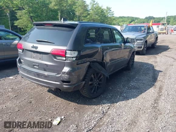2017 Jeep Grand Cherokee Altitude with VIN 1C4RJFAG4HC807439, listed as a IAAI auction lot 42468652 with 149,807 mi miles and . Bid and sale history available at DreamBid. Image 4.