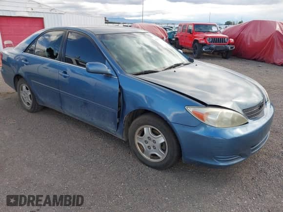 2003 Toyota Camry LE with VIN 4T1BF32K03U552842, listed as a IAAI auction lot 43221863 with 138,346 mi miles and . Bid and sale history available at DreamBid. Image 1.