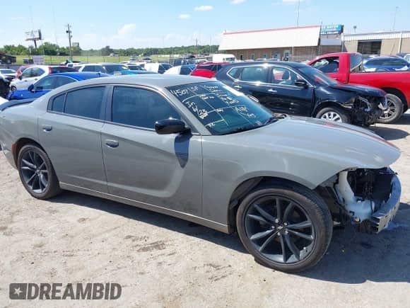 2018 Dodge Charger SXT Plus with VIN 2C3CDXHG1JH167383, listed as a IAAI auction lot 42826149 with 122,871 mi miles and . Bid and sale history available at DreamBid. Image 14.