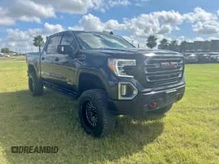 2022 GMC Sierra 1500 AT4 z VIN 3GTP9EEL9NG130186, wystawiony jako Copart lot #84041595 z przebiegiem 33 377 mil mil oraz Czysty tytuł • Clean title. Historia ofert i sprzedaży dostępna na DreamBid. Obrazek 1.