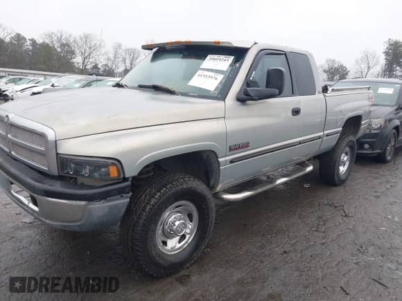 1999 Dodge 2500 with VIN 1B7KF2367XJ645185, listed as a IAAI auction lot 41553976 with 192,000 mi miles and . Bid and sale history available at DreamBid. Image 2.