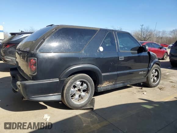 2003 Chevrolet Blazer Xtreme with VIN 1GNCS18X23K107727, listed as a Copart auction lot 45859075 with 233,270 mi miles and Salvage title. Bid and sale history available at DreamBid. Image 3.