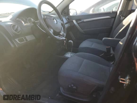 2007 Chevrolet Aveo LS с VIN KL1TD56667B112513, выставлен на аукционе Copart как лот 70374755 с пробегом 143 054 миль миль и Списание • Salvage title. История ставок и продаж доступна на DreamBid. Изображение 7.