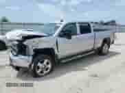 2019 Chevrolet Silverado 2500HD Work Truck z VIN 1GC1KREG9KF155249, wystawiony jako Copart lot #64574945 z przebiegiem 125 038 mil mil oraz Szkoda całkowita • Salvage title. Historia ofert i sprzedaży dostępna na DreamBid. Obrazek 1.
