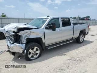 2019 Chevrolet Silverado 2500HD Work Truck z VIN 1GC1KREG9KF155249, wystawiony jako Copart lot #64574945 z przebiegiem 125 038 mil mil oraz Szkoda całkowita • Salvage title. Historia ofert i sprzedaży dostępna na DreamBid. Obrazek 1.