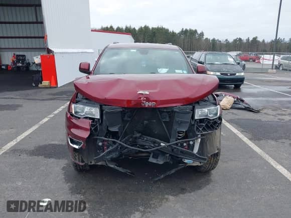 2019 Jeep Grand Cherokee Laredo E with VIN 1C4RJFAG2KC814154, listed as a IAAI auction lot 38877814 with 54,119 mi miles and . Bid and sale history available at DreamBid. Image 13.