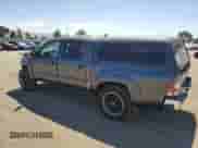 2015 Toyota Tacoma with VIN 5TFJX4CN8FX063880, listed as a Copart auction lot 68765415 with 115,810 mi miles and Salvage title. Bid and sale history available at DreamBid. Image 2.