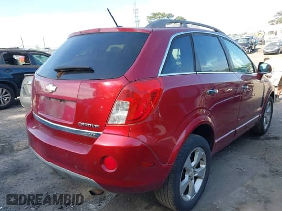 2014 Chevrolet Captiva Sport LTZ with VIN 3GNAL4EK3ES657587, listed as a IAAI auction lot 42070864 with 163,686 mi miles and . Bid and sale history available at DreamBid. Image 4.