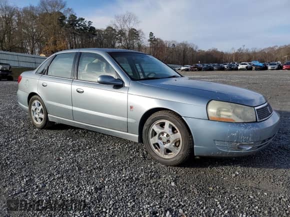 2003 Saturn LS с VIN 1G8JU54FX3Y573458, выставлен на аукционе Copart как лот 81230384 с пробегом 122 300 миль миль и Списание • Salvage title. История ставок и продаж доступна на DreamBid. Изображение 4.