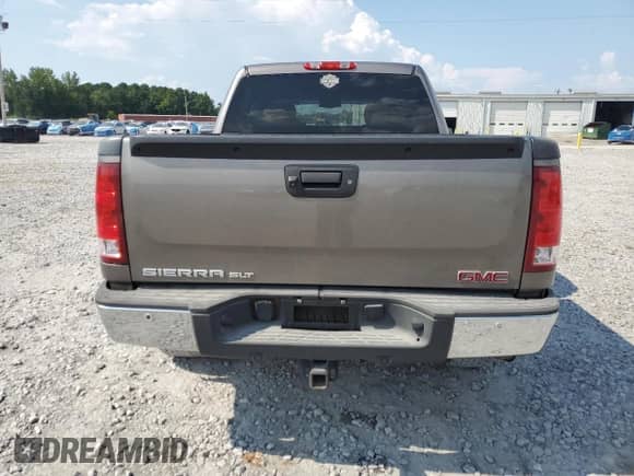 2013 GMC Sierra 1500 SLT с VIN 3GTP2WE79DG125341, выставлен на аукционе Copart как лот 69387625 с пробегом 245 621 миль миль и Списание • Salvage title. История ставок и продаж доступна на DreamBid. Изображение 6.