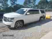 2017 Chevrolet Suburban LT z VIN 1GNSCHKC9HR182866, wystawiony jako IAAI lot #43348579 z przebiegiem 202 965 mil mil oraz . Historia ofert i sprzedaży dostępna na DreamBid. Obrazek 2.