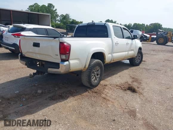 2018 Toyota Tacoma SR5 с VIN 5TFBZ5DN7JX004248, выставлен на аукционе IAAI как лот 42864580 с пробегом 210 482 миль миль и . История ставок и продаж доступна на DreamBid. Изображение 4.