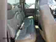 2002 GMC Sierra 1500 Denali z VIN 2GTFK69U221346006, wystawiony jako Copart lot #71726365 z przebiegiem 226 475 mil mil oraz Szkoda całkowita • Salvage title. Historia ofert i sprzedaży dostępna na DreamBid. Obrazek 10.