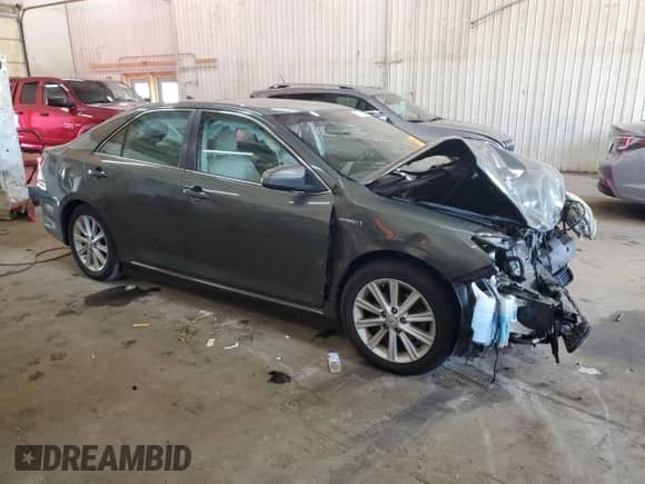 2012 Toyota Camry XLE with VIN 4T1BD1FK2CU055490, listed as a Copart auction lot 71053285 with Not provided miles and Salvage title. Bid and sale history available at DreamBid. Image 4.