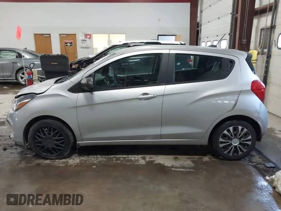 2018 Chevrolet Spark LS z VIN KL8CB6SA4JC458942, wystawiony jako IAAI lot #41238821 z przebiegiem 122 515 mil mil oraz . Historia ofert i sprzedaży dostępna na DreamBid. Obrazek 14.